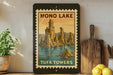 A framed poster of the Tufa Towers in Mono Lake, with a vintage-style illustration of the towers and a body of water.