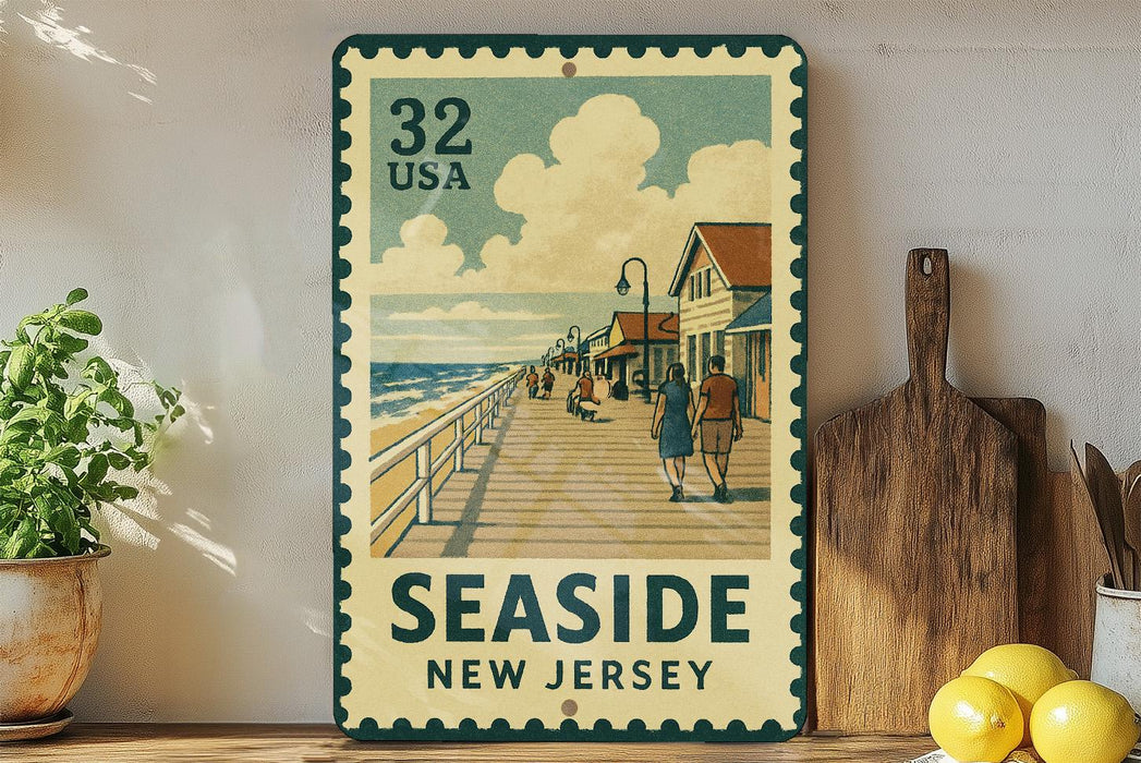 A vintage seaside postcard from New Jersey, featuring a wooden pier with people walking along it, is displayed on a wall next to a wooden cutting board and some potted plants.