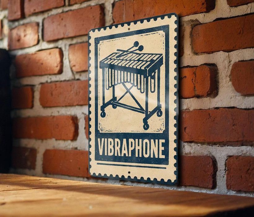 A vintage-style metal sign with a musical instrument on it, mounted on a brick wall.