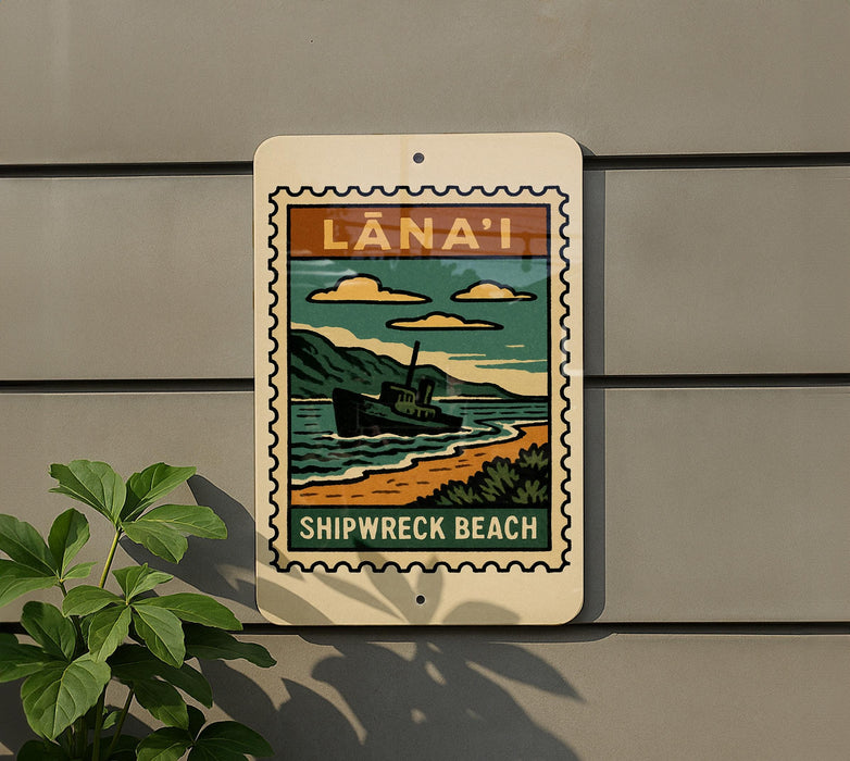 A sign for "Lana'i Shipwreck Beach" is displayed on a wall, featuring a vintage-style illustration of a shipwreck on a beach.