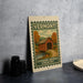 a vintage-style sign for Vermont's Covered Bridge Country, depicting a wooden bridge surrounded by autumn foliage.