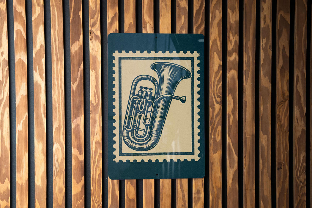 A blue and green metal sign with a musical instrument illustration is mounted on a wooden wall.