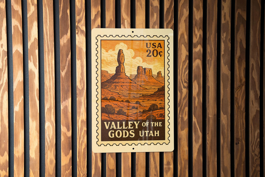 A vintage-style postage stamp depicting the Valley of the Gods in Utah, with the text "USA 20¢" printed on it.