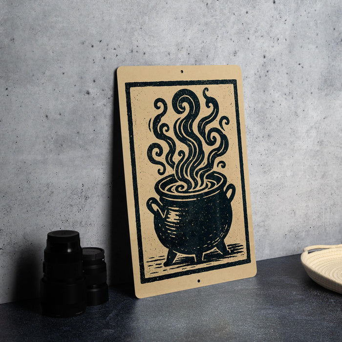 a black and white illustration of a cauldron with steam coming out of it, placed on a countertop next to some black containers.
