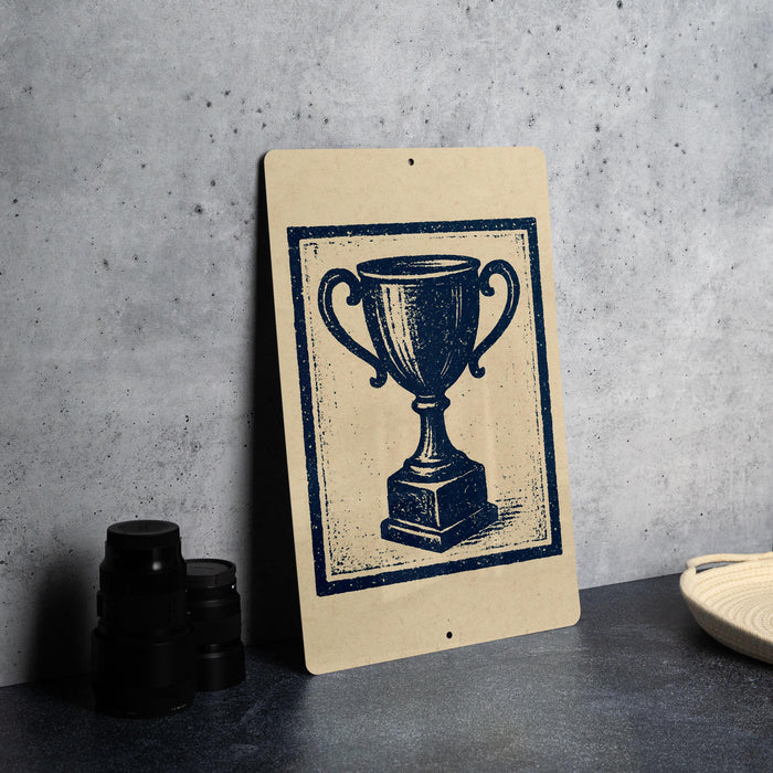 a trophy on a wall, with a stack of black camera lenses next to it.