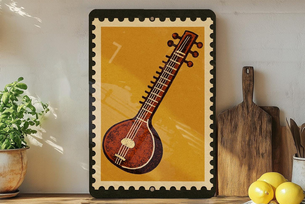 a framed illustration of a sitar, a traditional Indian stringed instrument, displayed on a shelf next to a wooden cutting board and a potted plant.