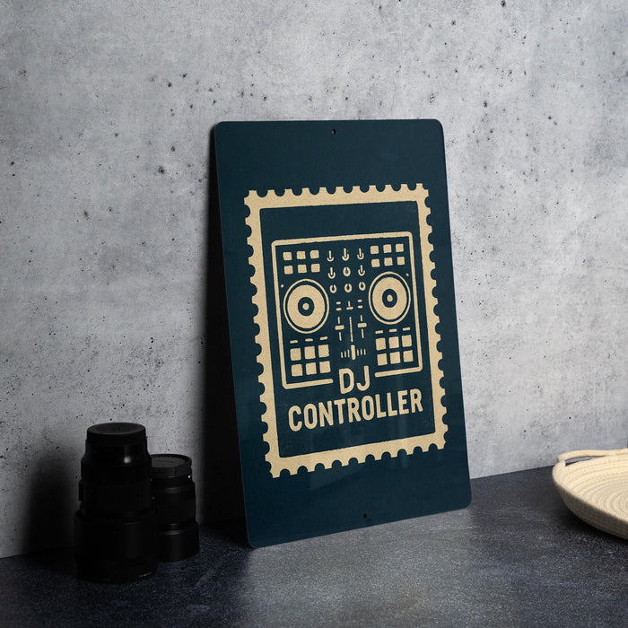 A black sign with a white graphic design and text, placed on a gray countertop next to some black camera lenses.