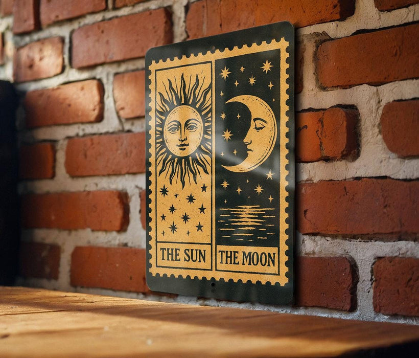 a sign with a sun and moon design, mounted on a brick wall.