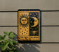 a sign with the words "THE SUN THE MOON" on it, mounted on a wall next to a plant.