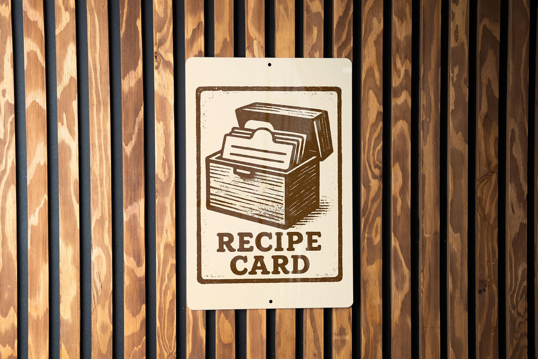 a sign that reads "RECIPE CARD" with an illustration of a recipe book.