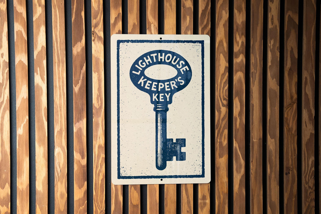 A sign with the text "LIGHTHOUSE KEEPER'S KEY" is displayed on a wooden wall.