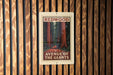 a sign that reads "REDWOOD AVENUE OF THE GIANTS" with a picture of a forest of tall trees.