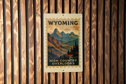 A poster of the High Country overlooks in Wyoming is displayed on a wooden wall.