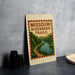 A sign for the Missouri River Bend Trail, featuring a scenic illustration of a river surrounded by lush greenery.