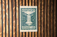 A sign for Kentucky Waterfall Loop is displayed on a wooden wall.