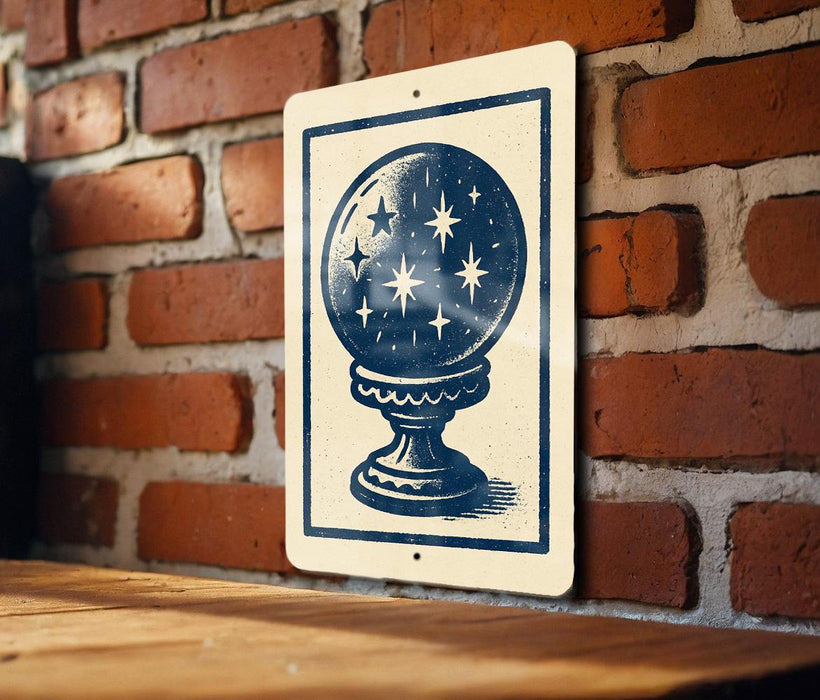 a sign with a blue and white design depicting a starry sky on a white background, mounted on a brick wall.