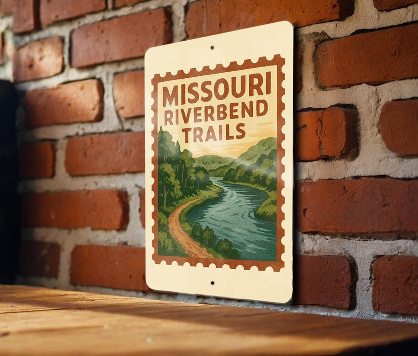 A sign for the Missouri River Bend Trail is displayed on a brick wall.