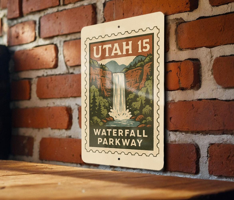 A metal sign with a waterfall and parkway is hanging on a brick wall.