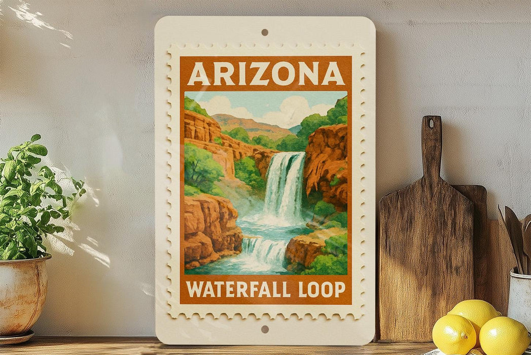 A framed poster of the Waterfall Loop in Arizona hangs on a wall, surrounded by kitchen utensils and a potted plant.