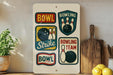 a sign with various bowling-related graphics and text, including a bowling ball, pins, and the words "BOWLING" and "BOWLING TEAM".