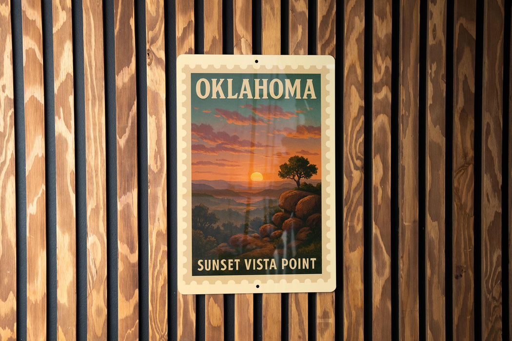 A vintage-style sign for the Sunset Vista Point in Oklahoma, featuring a scenic landscape with a sunset over a mountain range.