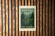 A metal sign with a forest canopy walk in Montana, featuring a person walking on a bridge surrounded by pine trees.
