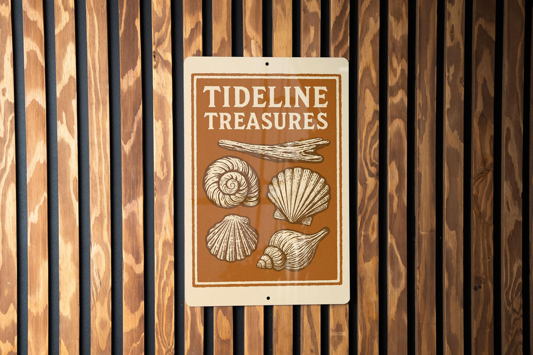 a sign with the text "TIDELINE TREASURES" and illustrations of various seashells.