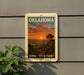 A vintage-style sign for Oklahoma Sunset Vista Point, featuring a scenic landscape with a sunset over a mountain range.