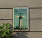 A sign for Illinois Great Lakes Lighthouses, featuring a lighthouse illustration on a green background.