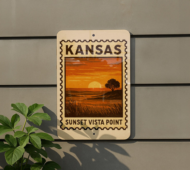 A sign for Kansas Sunset Vista Point is displayed on a wall, featuring an illustration of a sunset over a field.