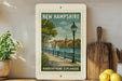 A framed poster of a harborfront esplanade in New Hampshire, featuring a scenic view of the water and boats.