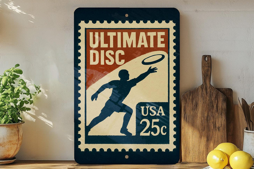 A vintage-style sign advertising Ultimate Disc, featuring a silhouette of a person throwing a frisbee, with a 25c postage stamp price tag.