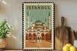 A framed illustration of the Blue Mosque, a famous landmark in Istanbul, Turkey, is displayed on a wall.