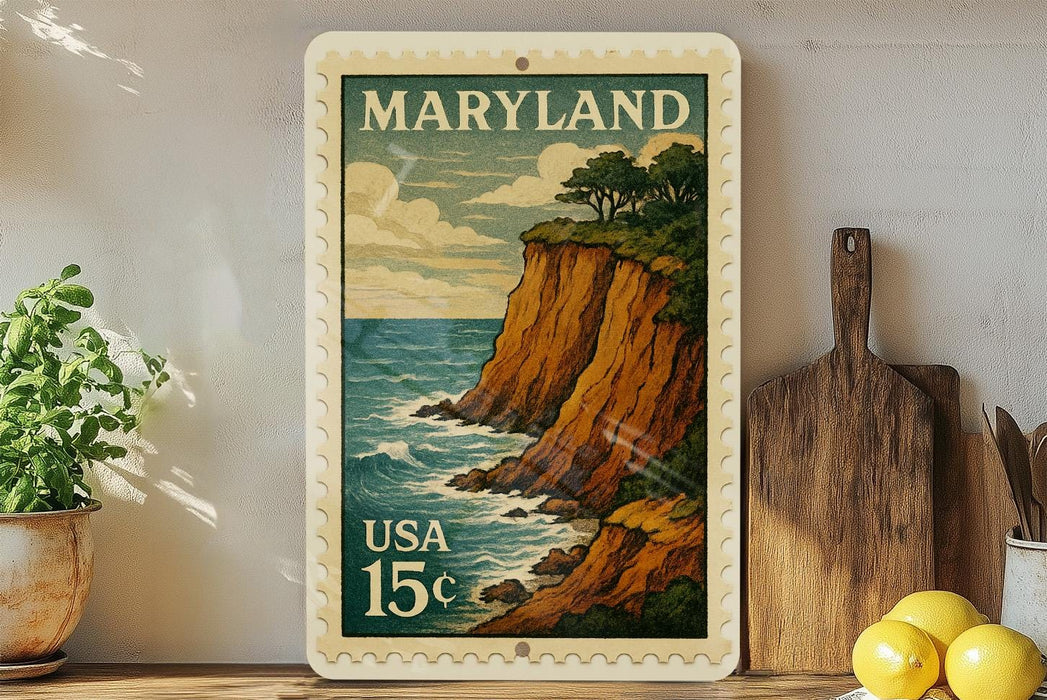 A framed postage stamp depicting a scenic coastal landscape in Maryland, with a cliff overlooking the ocean.