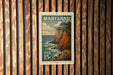 A vintage Maryland postage stamp is displayed on a wooden wall.
