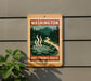 A sign for the Hot Springs Route in Washington, featuring a scenic illustration of a hot spring surrounded by pine trees and mountains.