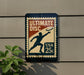 A sign for Ultimate Disc, featuring a silhouette of a person catching a frisbee, mounted on a wall.