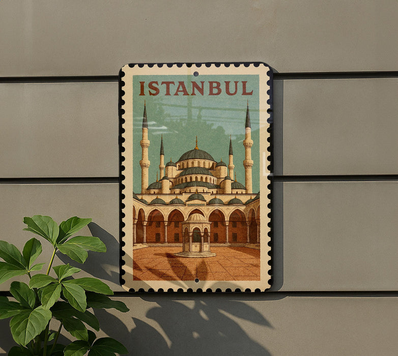 A framed poster of the Blue Mosque, a famous landmark in Istanbul, Turkey, is displayed on a wall.