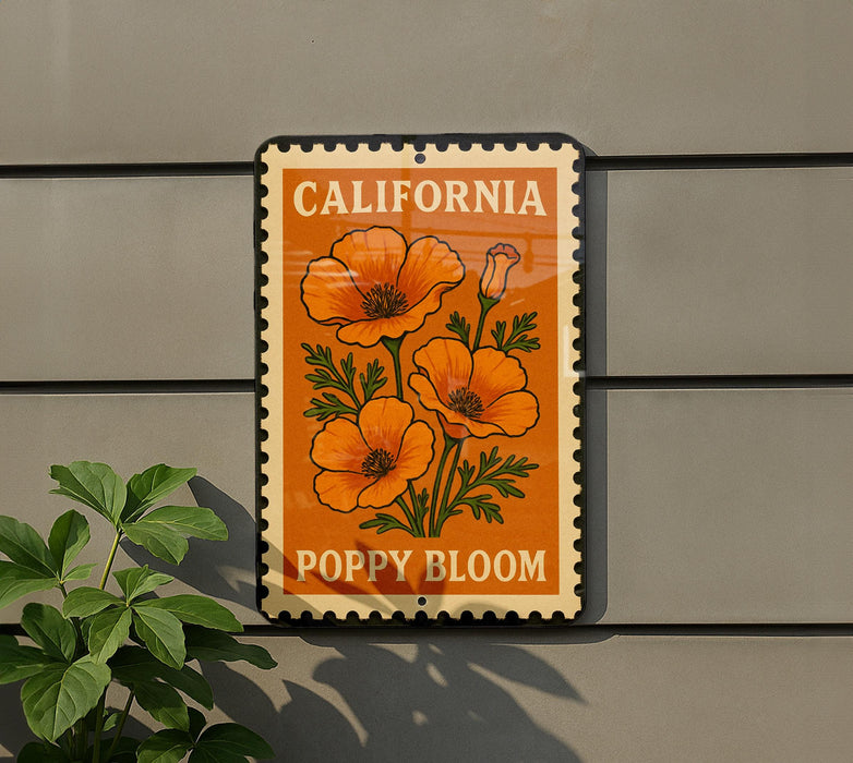 a California postage stamp with an illustration of orange poppies and the text "POPPY BLOOM" on a gray wall.