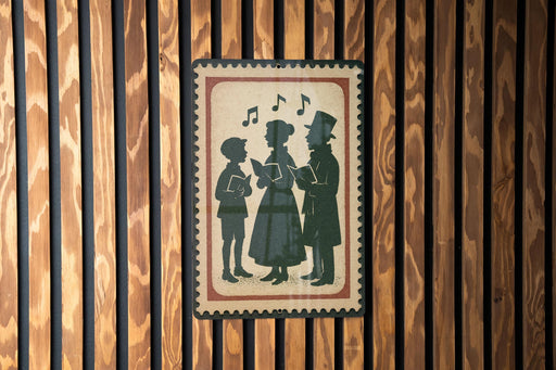 A framed image of three people, likely a group of three individuals, is displayed on a wooden wall.