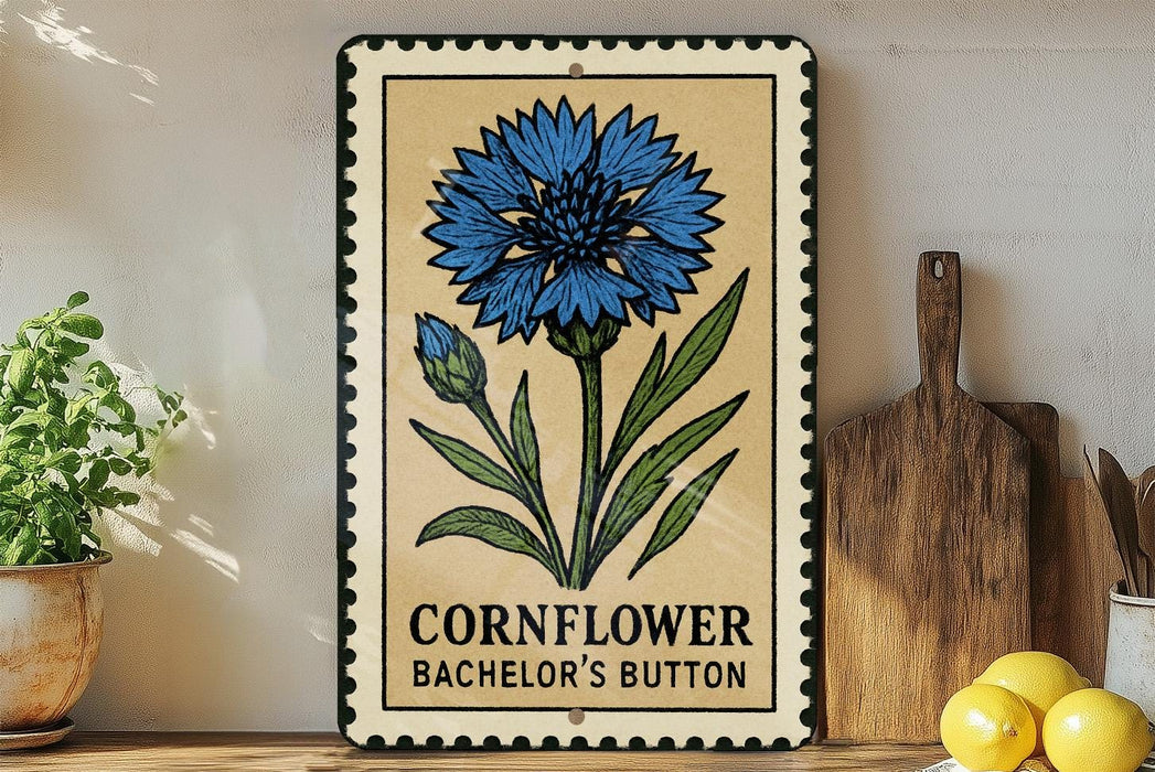 a decorative metal sign with a blue flower illustration, placed on a wooden surface next to a wooden cutting board and some lemons.