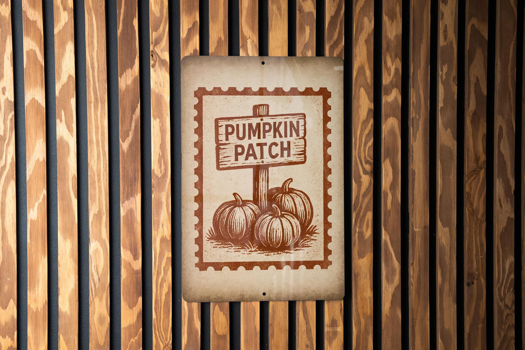 a sign that reads "Pumpkin Patch" with a pumpkin illustration, mounted on a wooden wall.