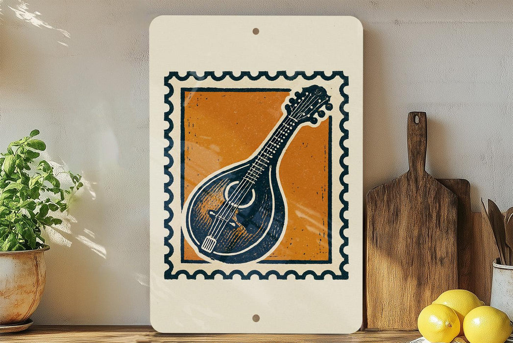 a framed print of a mandolin, a musical instrument, displayed on a shelf next to a wooden cutting board and some lemons.
