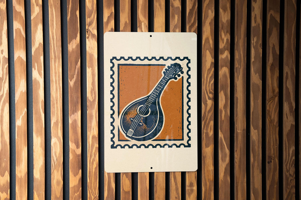 a wooden wall with a metal sign featuring a mandolin graphic.