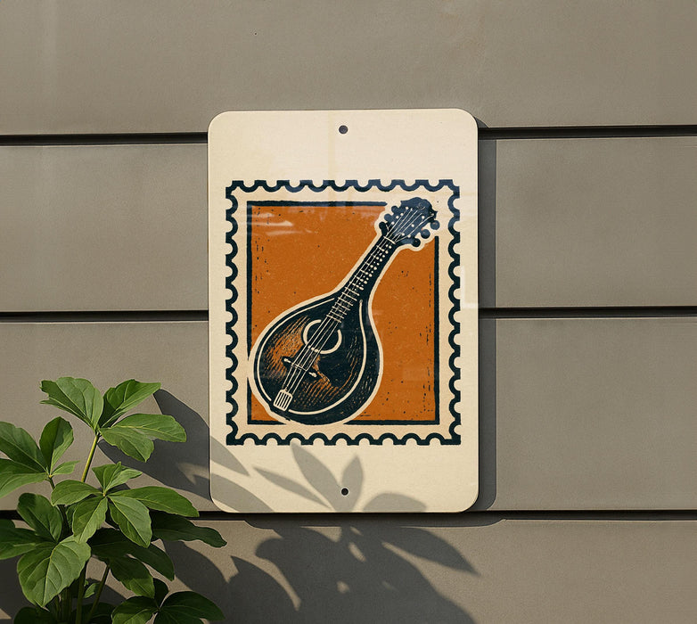 a square sign with an illustration of a mandolin, which is mounted on a wall.