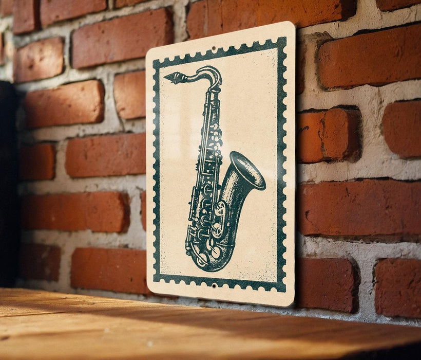 A framed image of a saxophone is hanging on a brick wall.