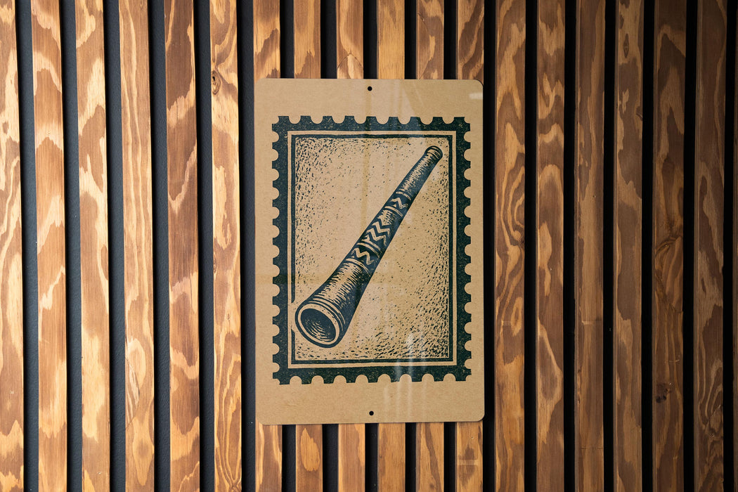 A wooden wall with a rectangular sign featuring an illustration of a telescope or binoculars.