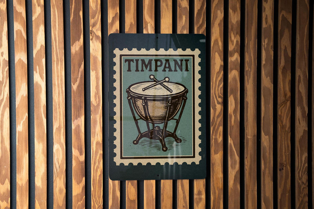 A metal sign with a drum design is mounted on a wooden wall.