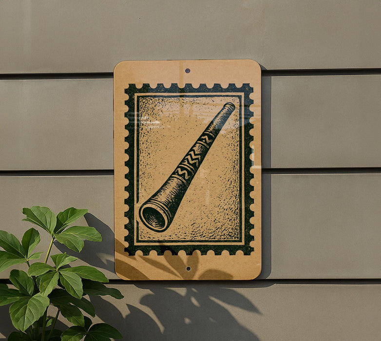 a wooden sign with a picture of a horn or pipe on it, mounted on a wall.