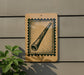 a wooden sign with a picture of a horn or pipe on it, mounted on a wall.